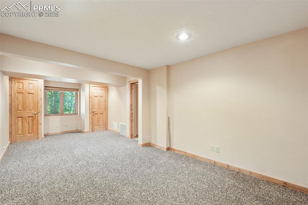Image 35 of 47: 4th bedroom in the basement. Nice and cool