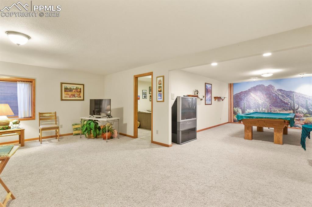 Image 29 of 48: Playroom featuring carpet flooring and pool table