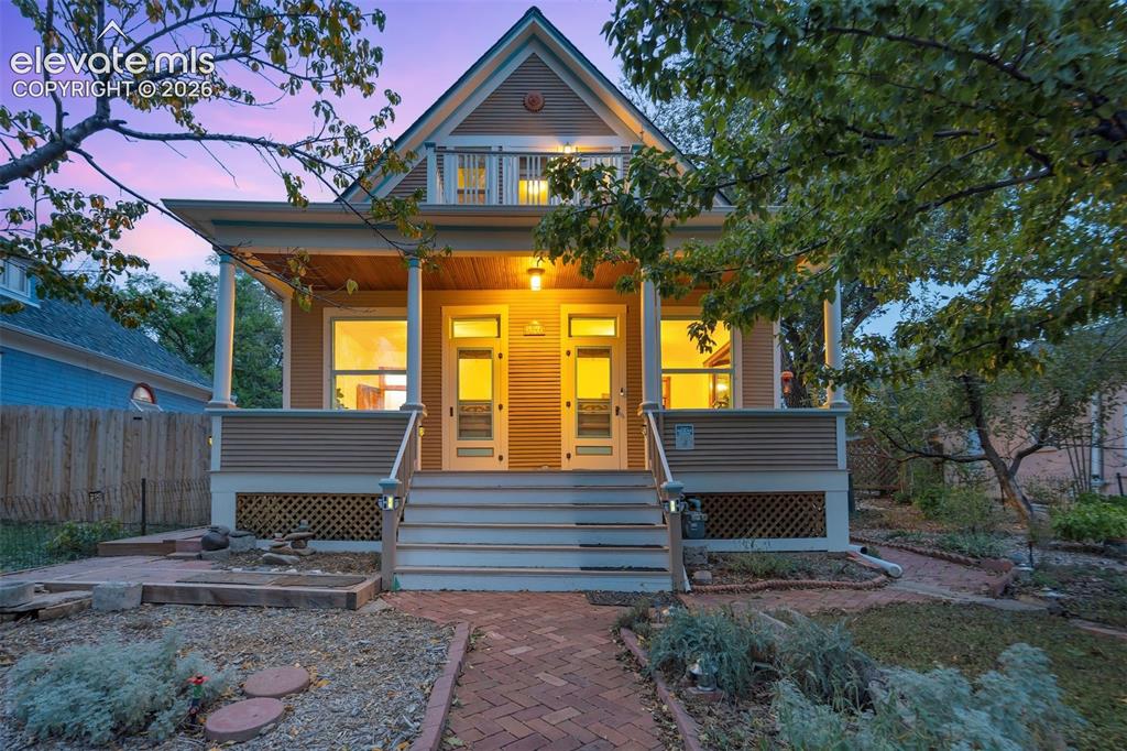 Image 2 of 40: Front of home at twilight!