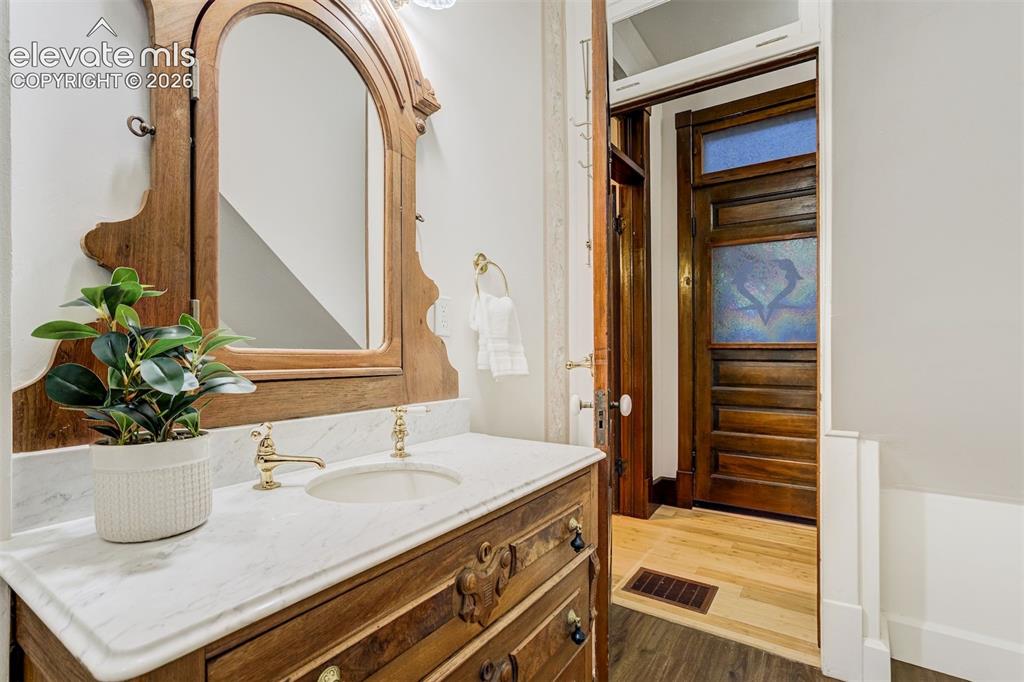 Image 20 of 40: Main level Bath #1, second vieew