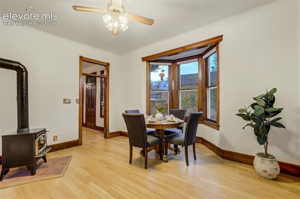 Image 4 of 40: Natural hardwood in this dining OR sitting area.  