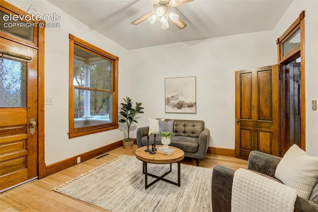 Image 7 of 40: Lots of warmth and charm in this living room space