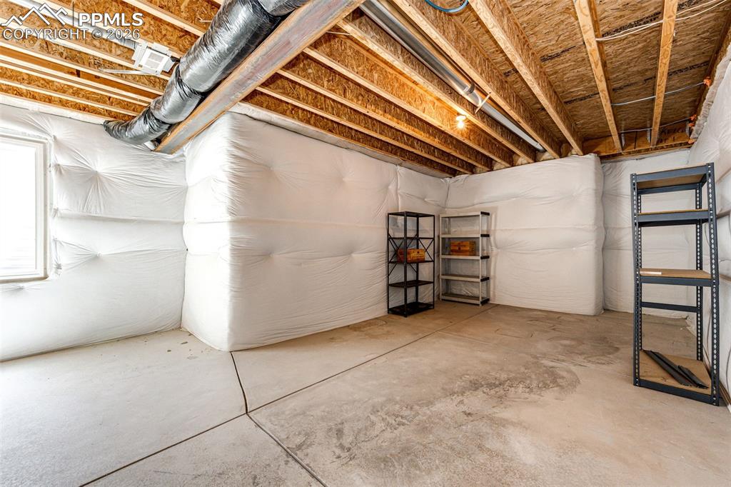 Image 27 of 46: Unfinished storage area