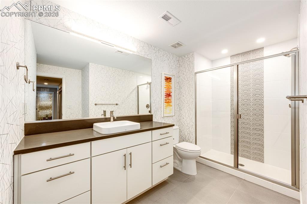 Image 32 of 47: Lower Level bath has large shower