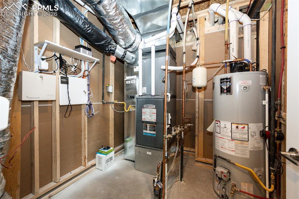 Image 33 of 47: Notice the direct vented High efficient Furnace and hot water heater