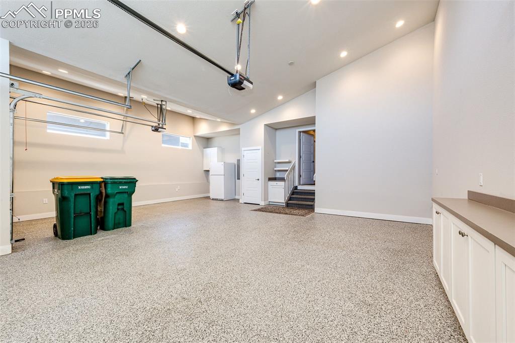 Image 35 of 46: The garage is awesome. Beautifully finished and the garage refrigerator sta