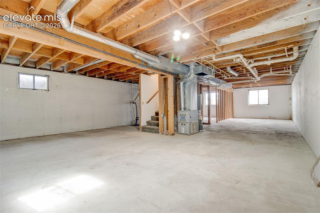 Image 31 of 33: Unfinished Basement - add a bedroom/family room and bath!