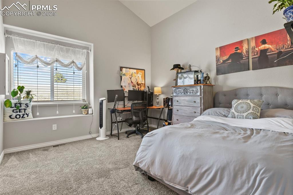 Image 19 of 49: Main Floor bedroom with attached bath