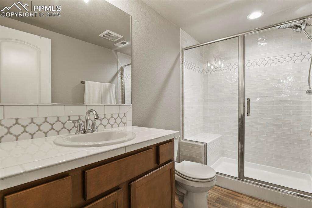 Image 28 of 49: Basement suite bathroom