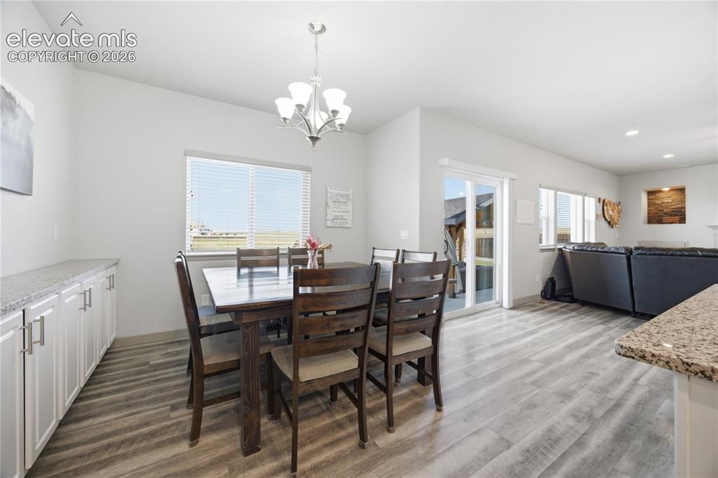 Image 11 of 40: Roomy dining area with a built-in buffet