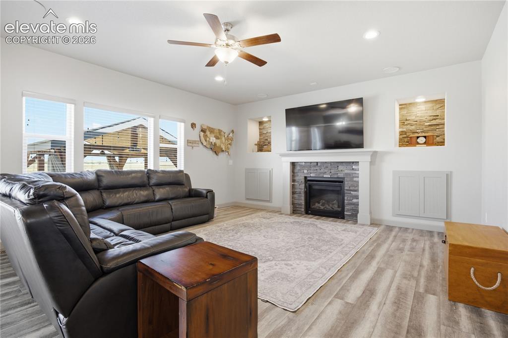 Image 13 of 40: Cozy living room with gas fireplace