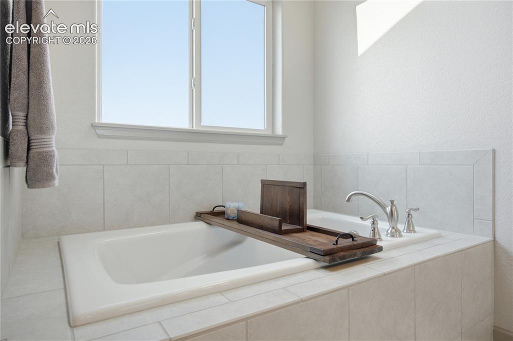 Image 18 of 40: Soak your cares away
