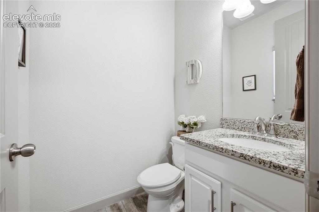 Image 5 of 40: Main level powder room