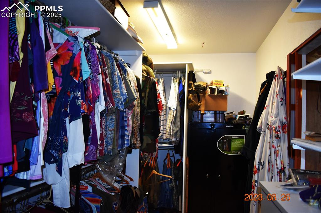 Image 18 of 48: This is the other end of that walk in closet which also has room for safe. 