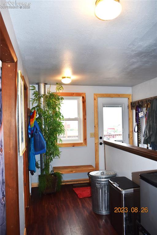 Image 20 of 48: South entry leads to maim home and basement. 