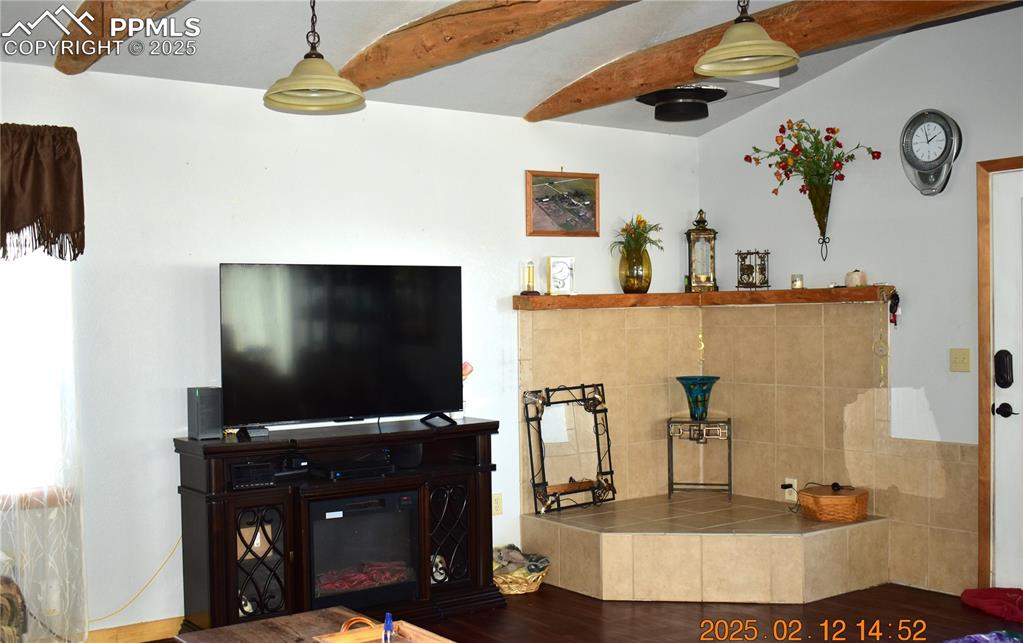 Image 4 of 48: Large Living Room with scratch resistant, waterproof flooring and ceiling b