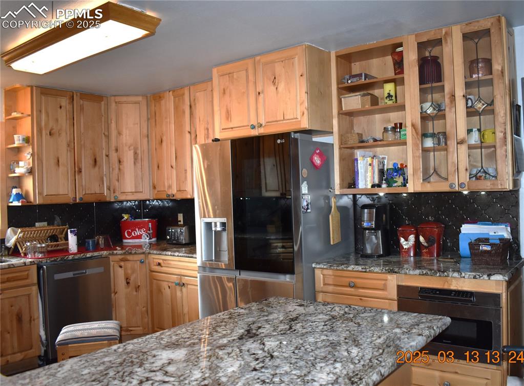 Image 8 of 48: New dishwasher, newer Frig, range and trash compactor and Microwave.  Grani