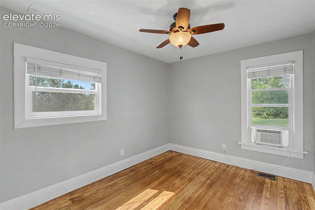 Image 12 of 20: Living room, and dining room, Douglas Fir solid wood floor