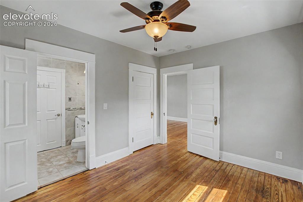Image 13 of 20: Living room, and dining room, Douglas Fir solid wood floor