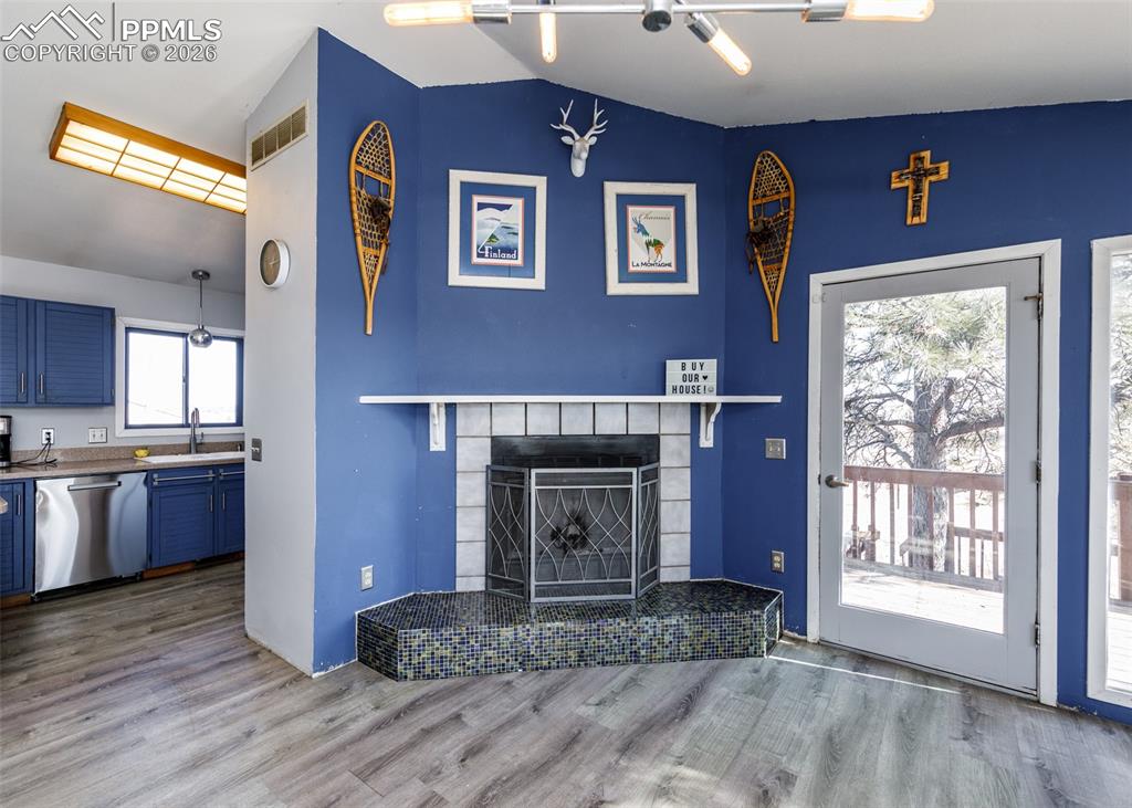 Image 4 of 49: Wood burning fireplace