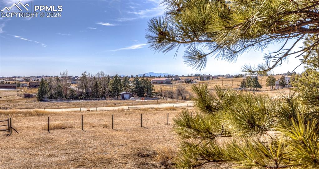 Image 40 of 49: View of Pikes Peak from deck