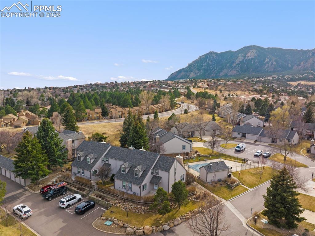 Image 3 of 47: Aerial perspective of townhome with mountain views