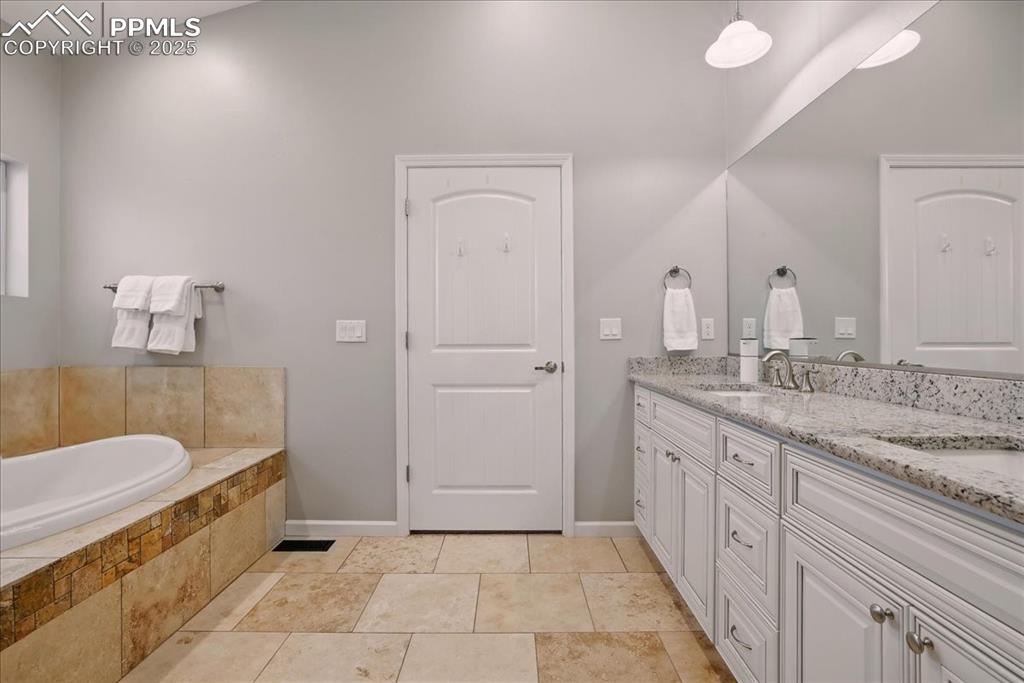 Image 12 of 46: Master Bathroom