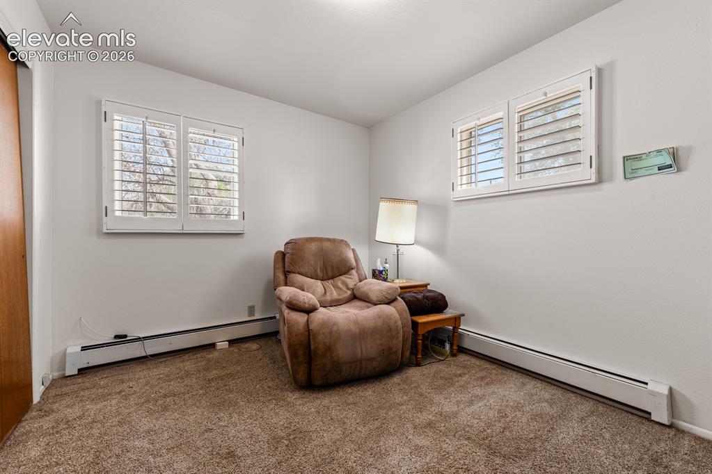 Image 7 of 28: Sitting Room