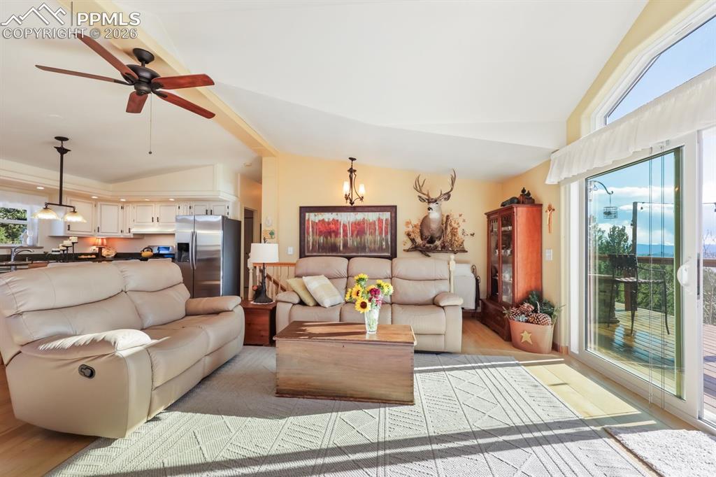 Image 17 of 48: Great room with walkout on to the deck!