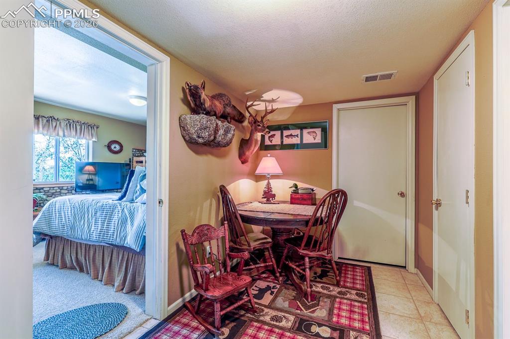Image 31 of 48: Game room. Mud room!