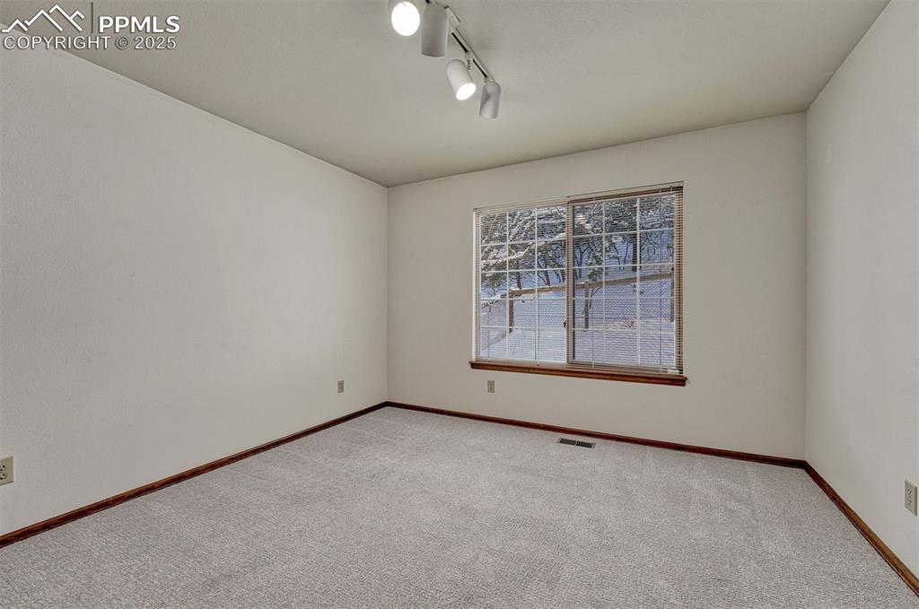 Image 33 of 50: Office or second main level bedroom