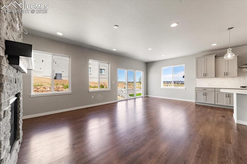 Image 12 of 37: Great Room, Dining area, and Kitchen