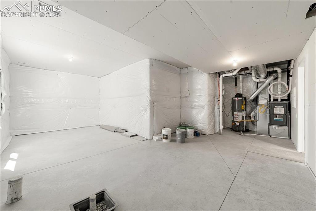 Image 35 of 37: Unfinished Storage/Mechanical Room