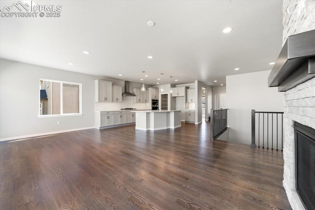 Image 9 of 37: Great Room, Dining area, and Kitchen