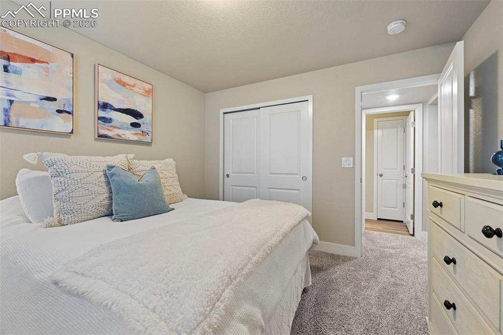 Image 33 of 42: basement bedroom