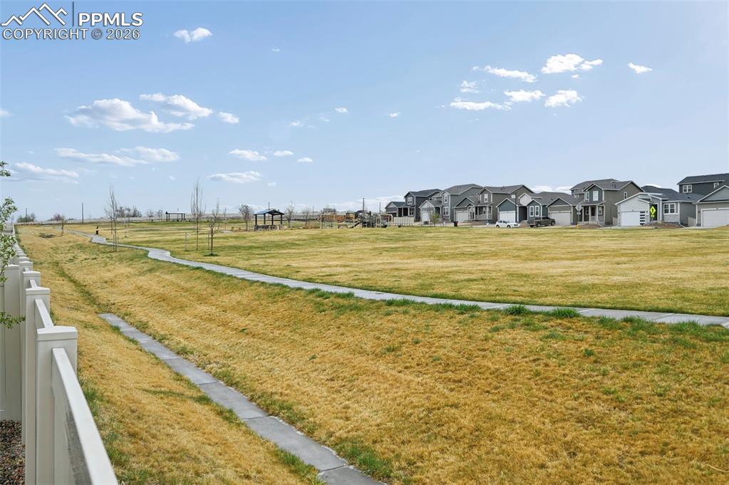 Image 39 of 42: backs to neighborhood park