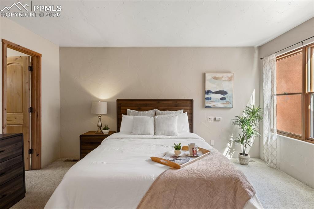 Image 24 of 38: Bedroom