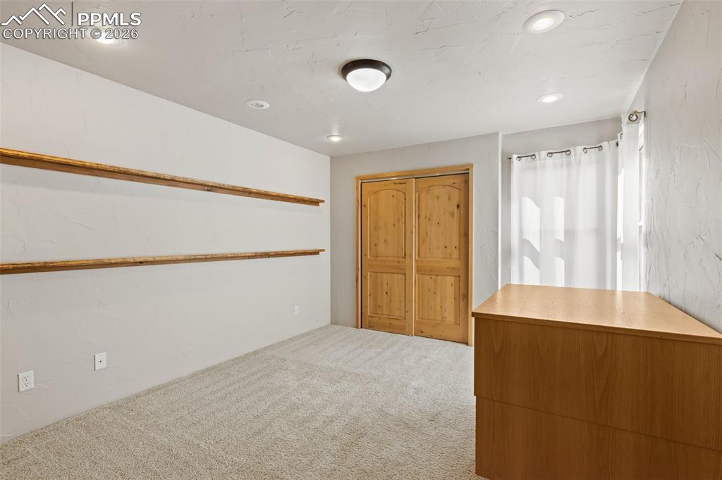 Image 31 of 38: Bedroom