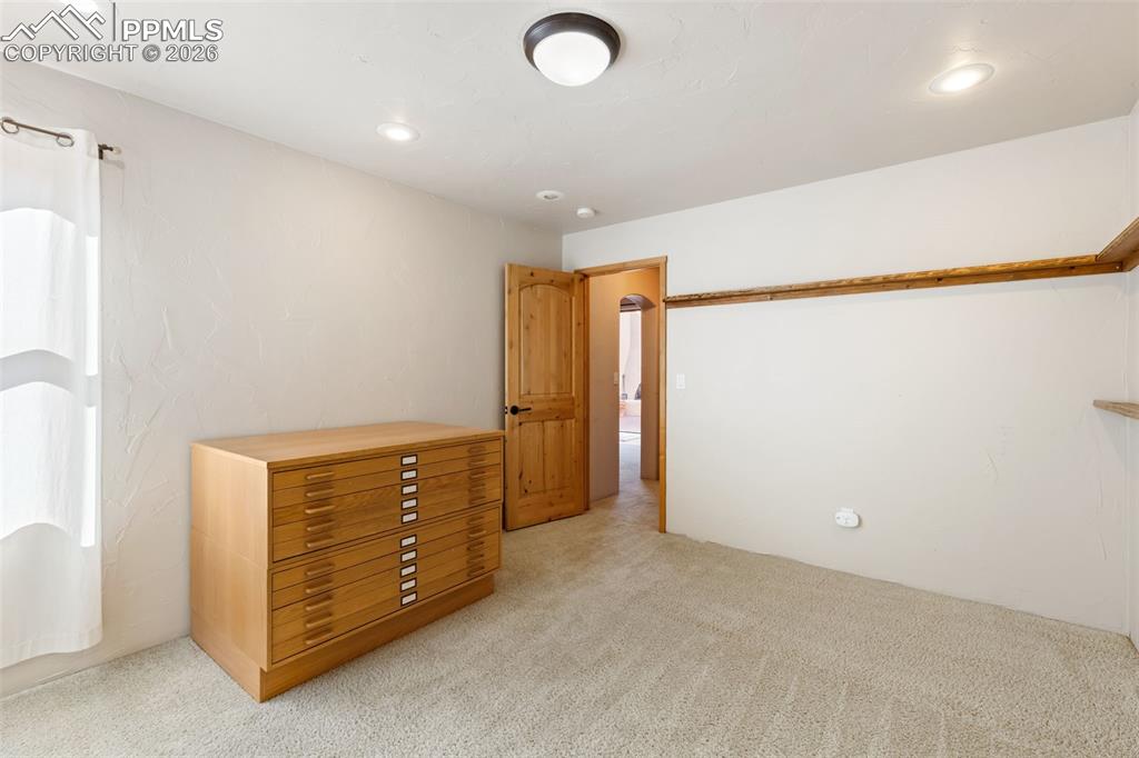 Image 32 of 38: Bedroom