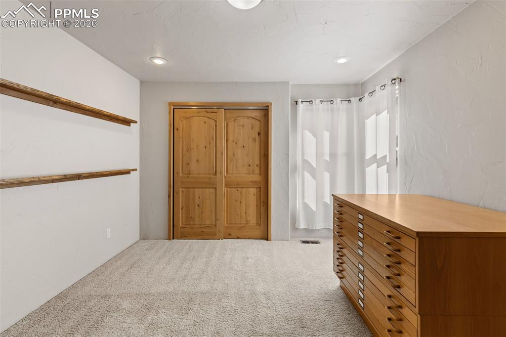 Image 33 of 38: Bedroom