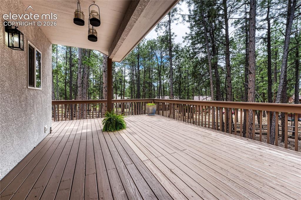 Image 17 of 49: ...to the expansive, partially covered deck.