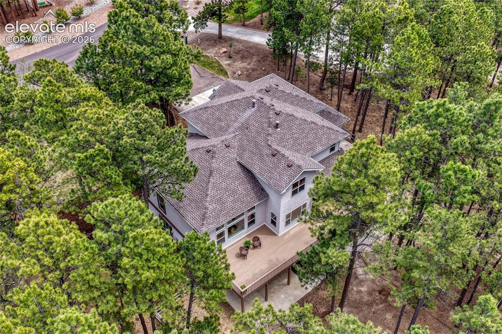 Image 2 of 49: 3,884 sq ft with 4 bedrooms, 4 bathrooms and an oversized 3-car garage.