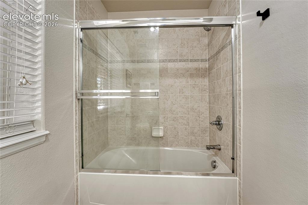 Image 44 of 49: ...has upgraded flooring, vanity and countertop.