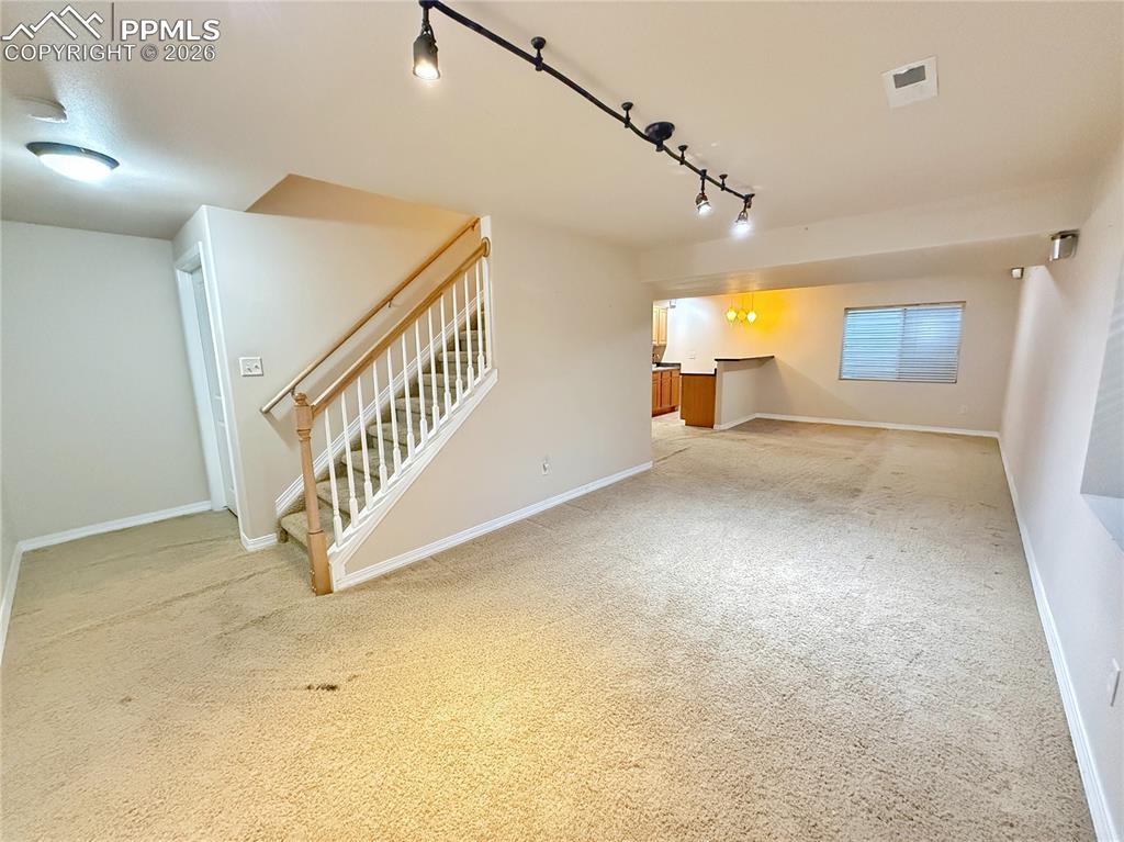 Image 23 of 28: Basement living area