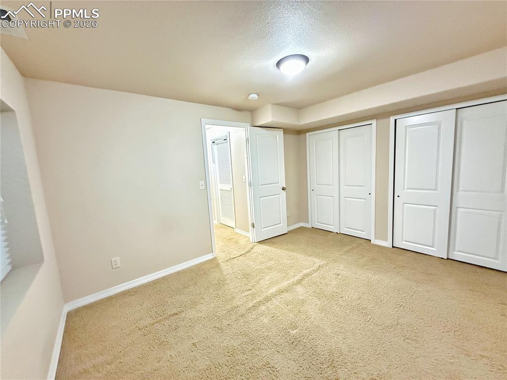 Image 24 of 28: Bedroom #5 located in basement