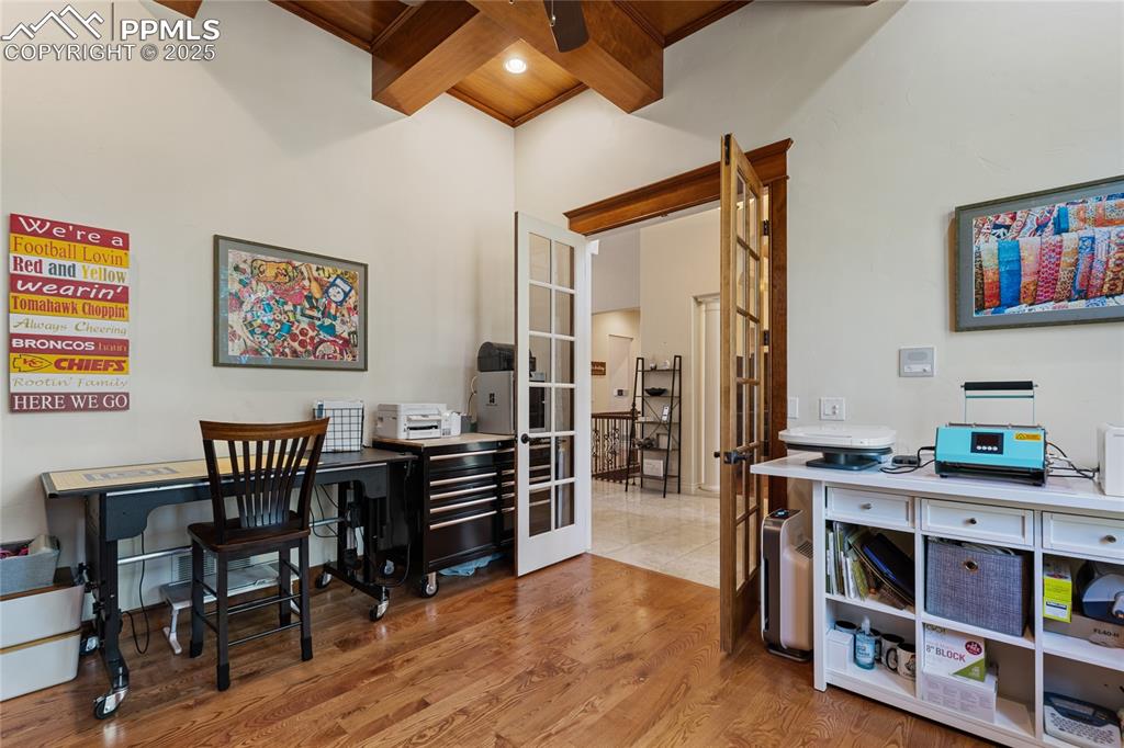 Image 5 of 46: This office with beamed ceilings is a show stopper! There are 10