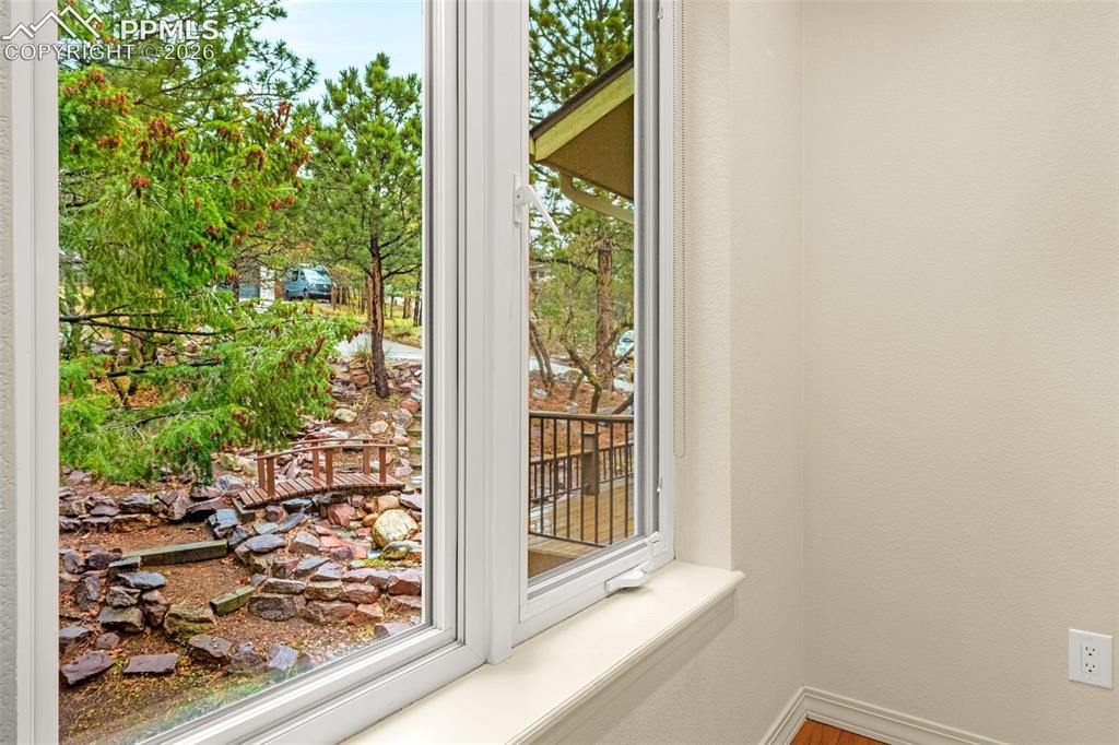 Image 27 of 47: reading nook with stream view