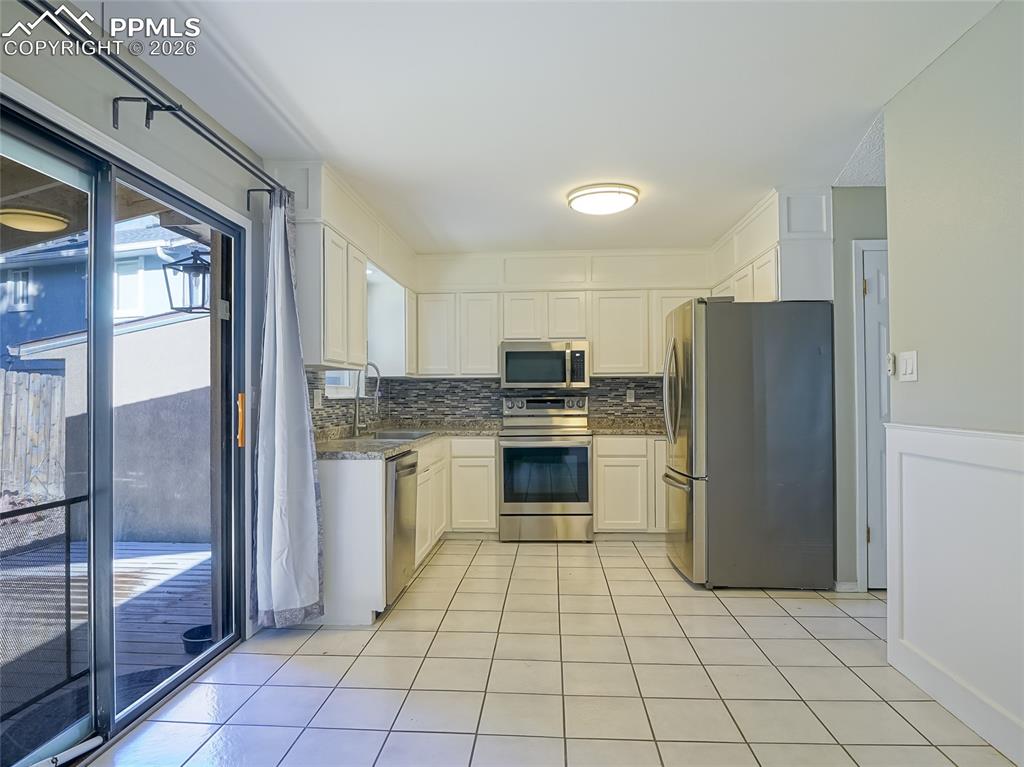 Image 5 of 36: Kitchen-Dining 1