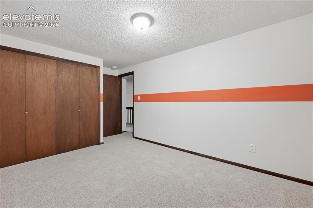 Image 30 of 50: Bedroom 2 with electrical added at ceiling height perfect for camera or LED