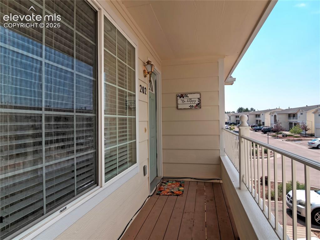 Image 1 of 18: Front balcony entrance